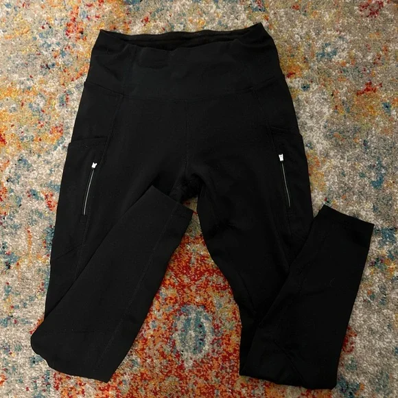 Black Athleta Leggings with Zipper Pockets - Picture 1 of 8